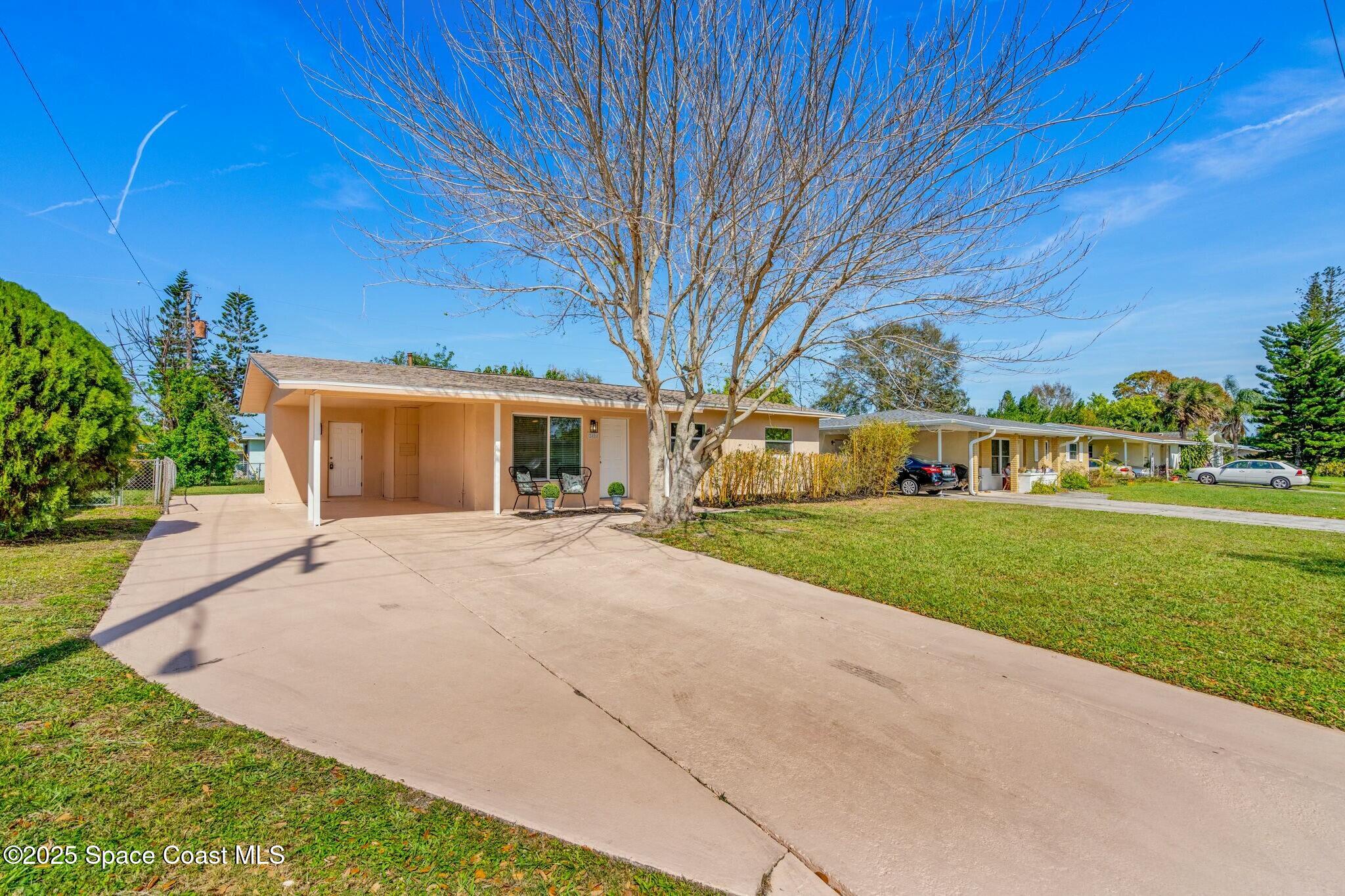 2406 Fatzler Road Melbourne, FL 32935 - Photo 4 of 33 tempImagepql2uK