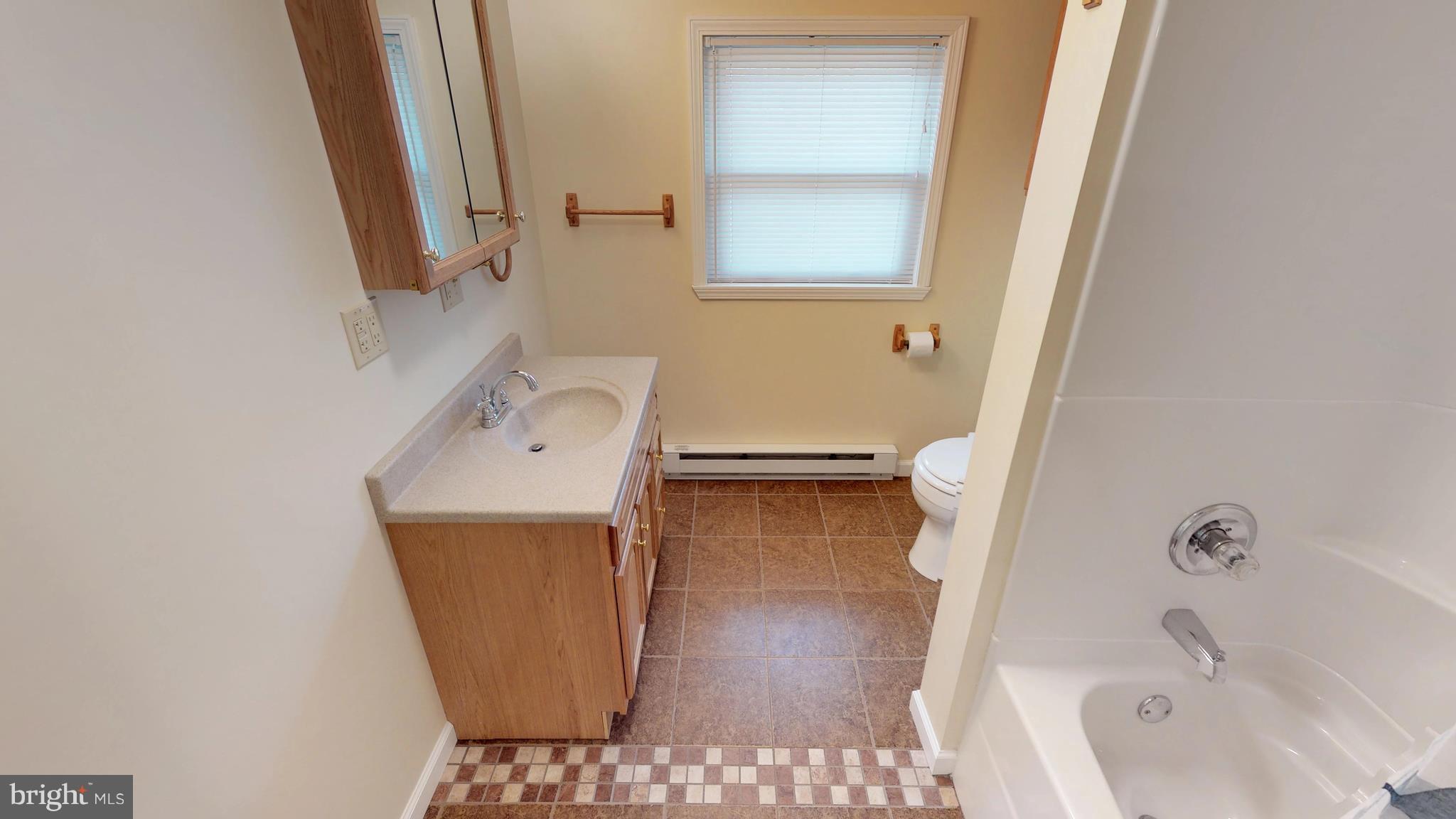 13904 Craddock Road Southwest Cumberland, MD 21502 - Photo 13 of 25 Bath has oak vanity