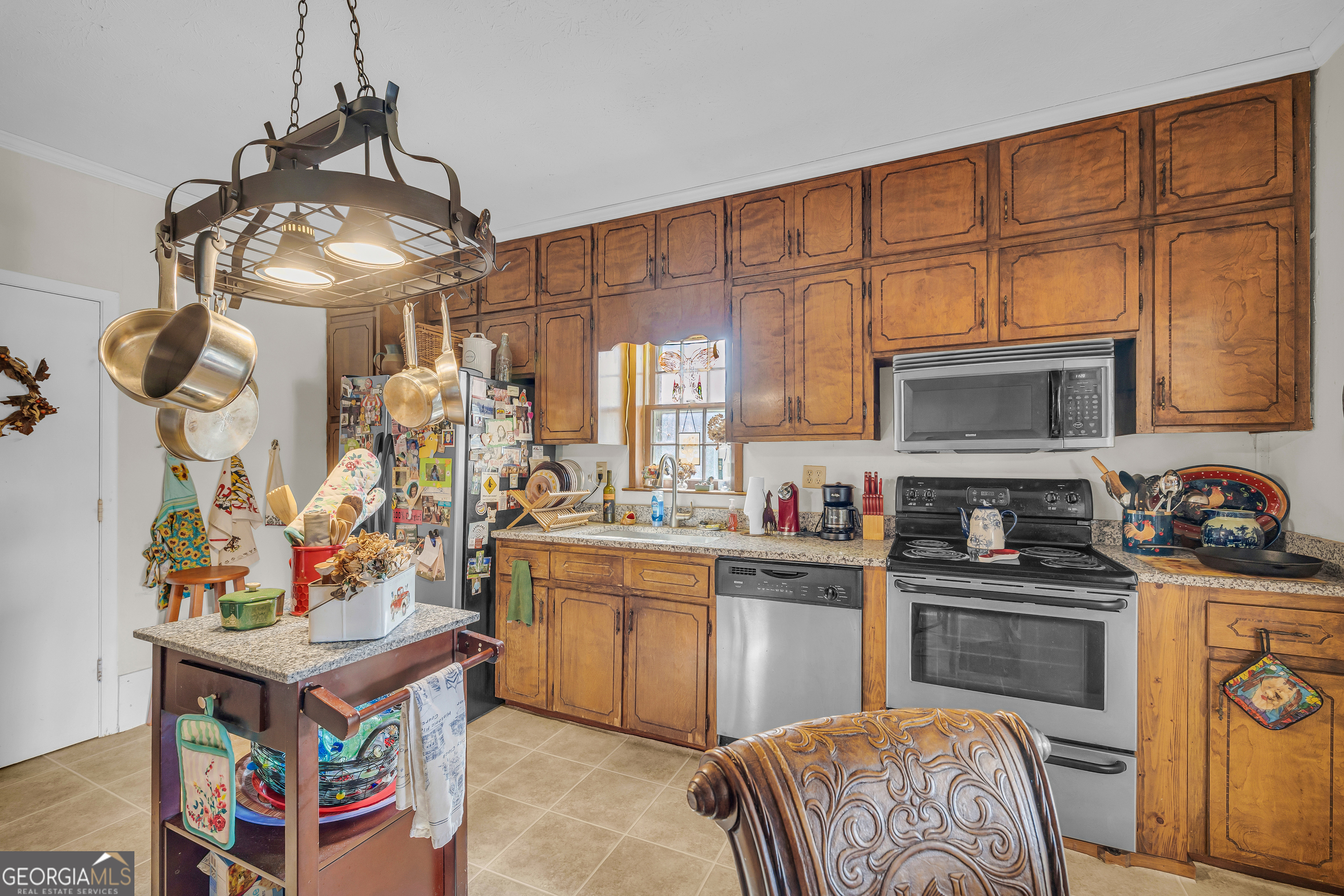 1640 Wire Bridge Road Watkinsville, GA 30677 - Photo 14 of 74 a kitchen with stainless steel appliances granite countertop a sink dishwasher stove and oven with cabinets