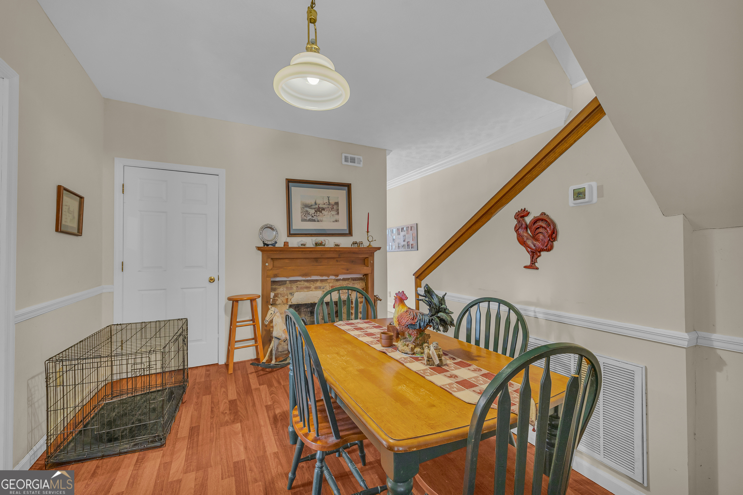 1640 Wire Bridge Road Watkinsville, GA 30677 - Photo 17 of 74 a dining room with furniture and wooden floor