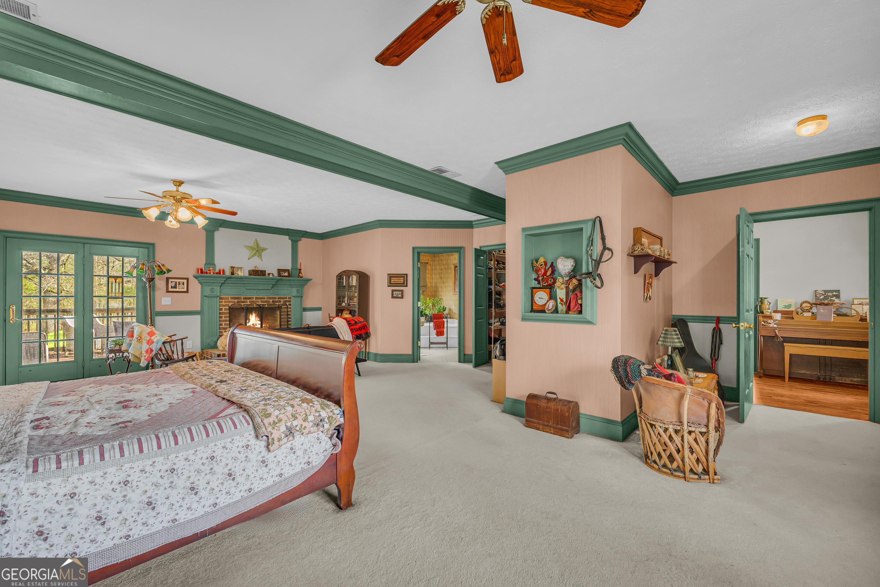 1640 Wire Bridge Road Watkinsville, GA 30677 - Photo 19 of 74 a bedroom with furniture and a large window