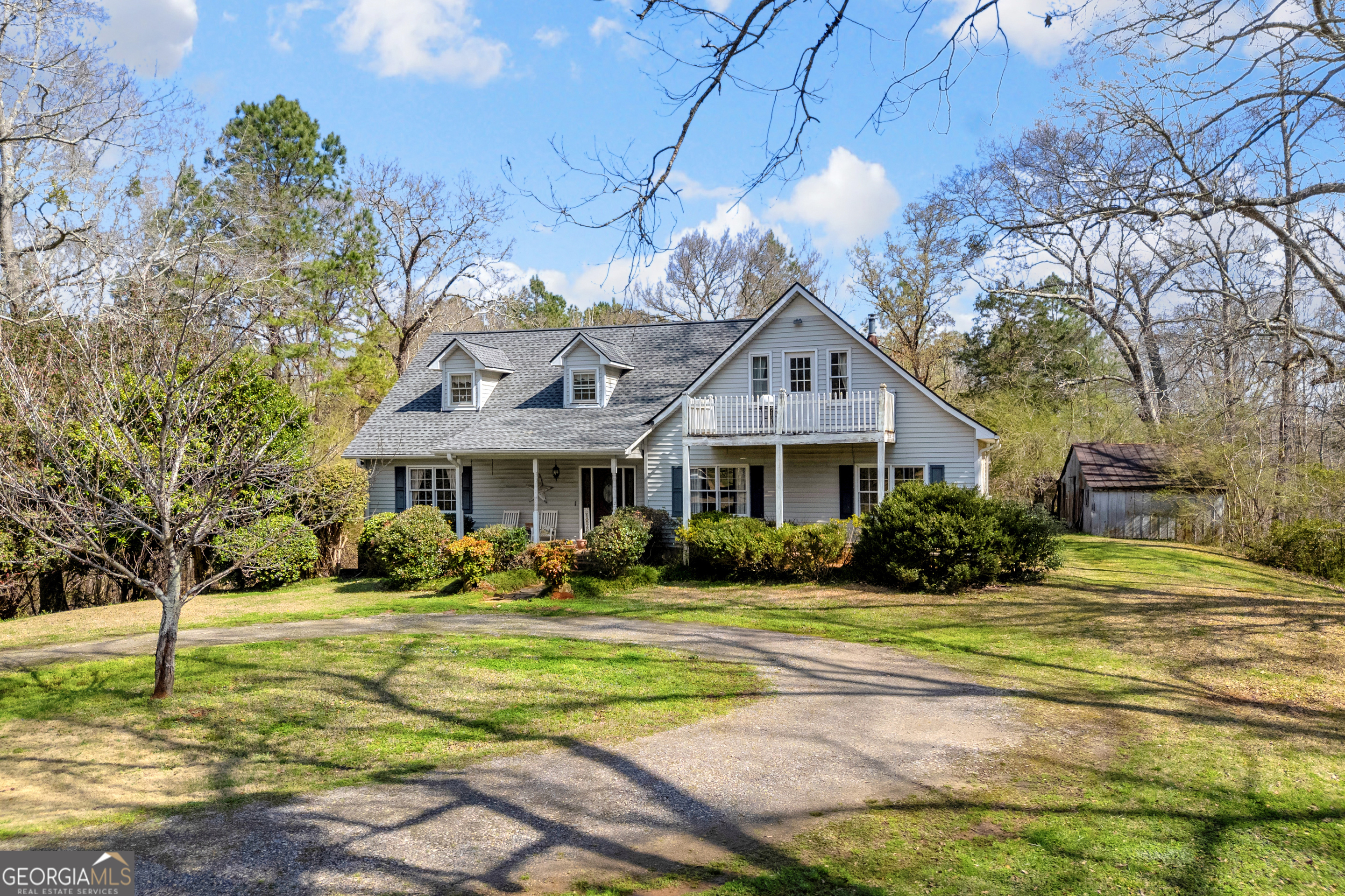1640 Wire Bridge Road Watkinsville, GA 30677 - Photo 2 of 74 a front view of a house with garden