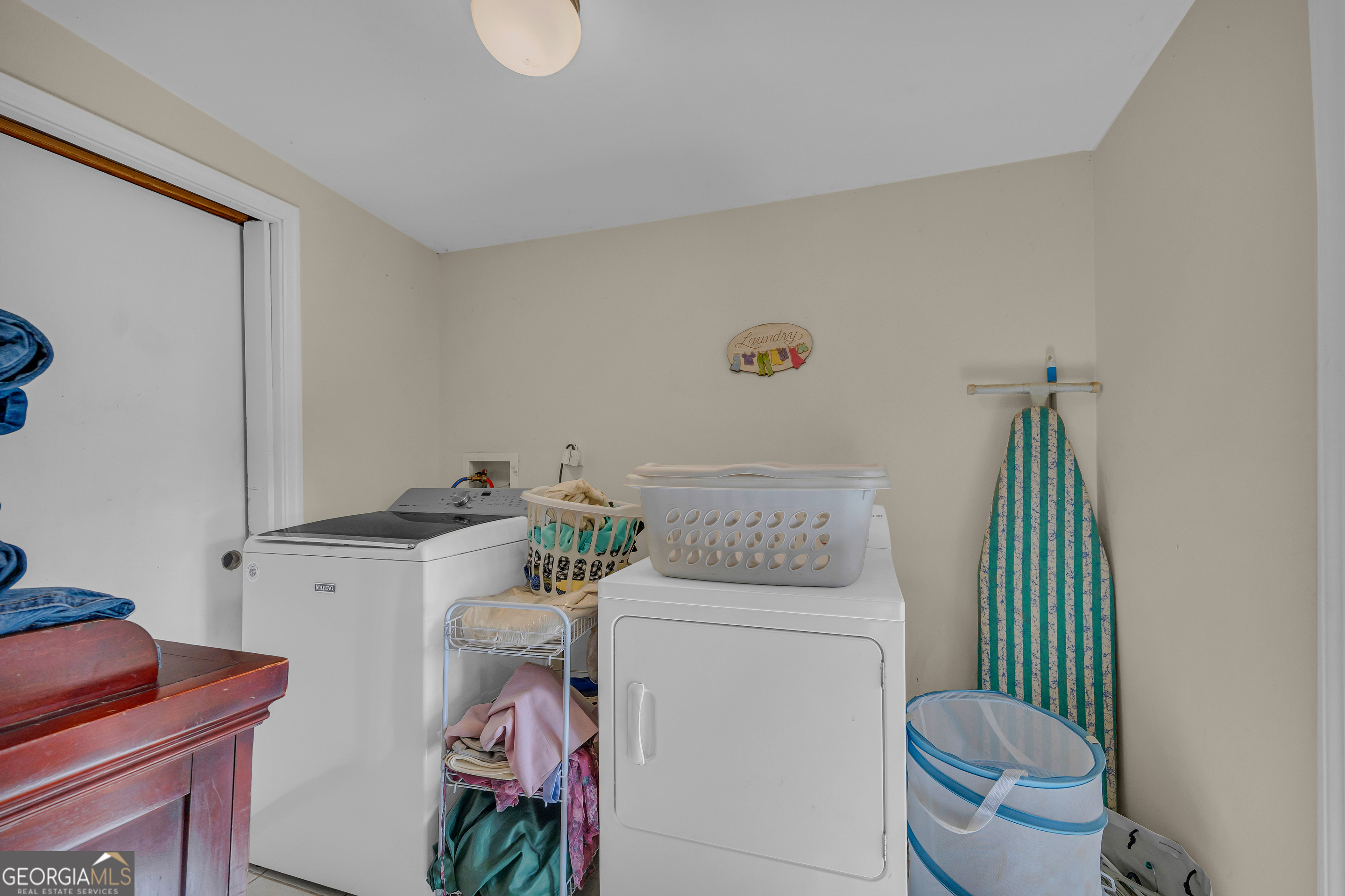 1640 Wire Bridge Road Watkinsville, GA 30677 - Photo 25 of 74 a utility room with dryer and washer
