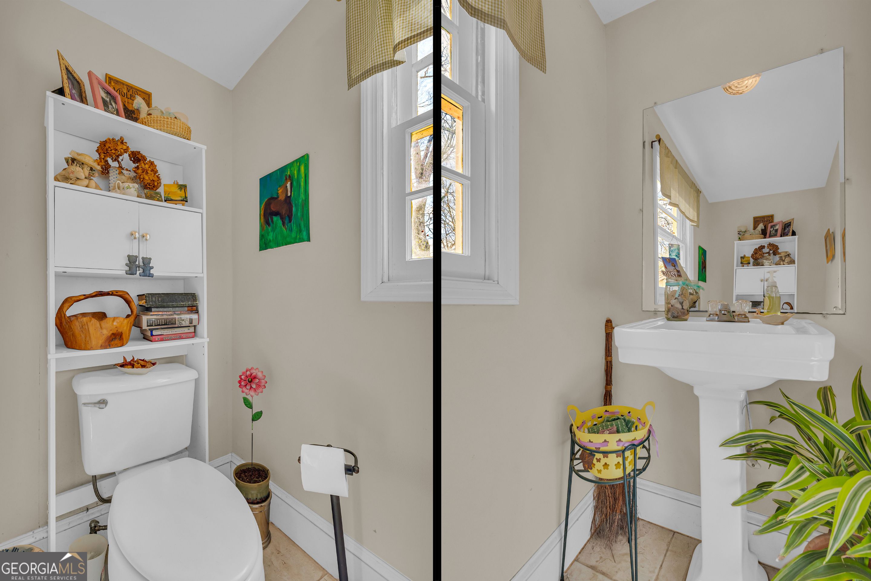 1640 Wire Bridge Road Watkinsville, GA 30677 - Photo 26 of 74 a bathroom with a toilet sink and mirror