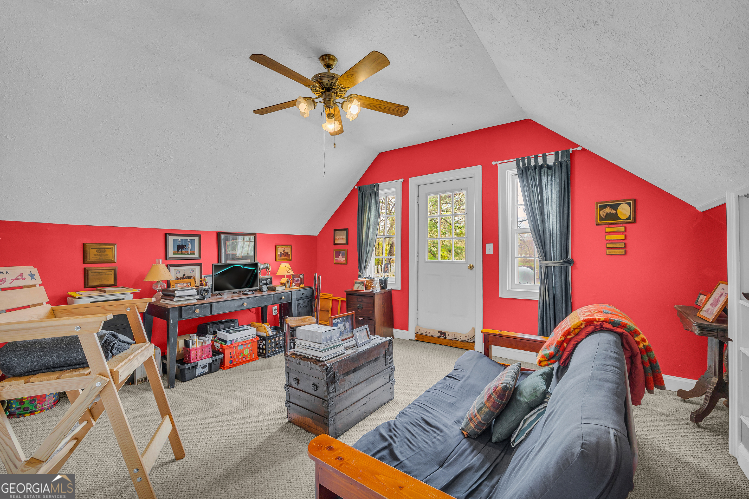 1640 Wire Bridge Road Watkinsville, GA 30677 - Photo 29 of 74 a living room with furniture a rug and a large window