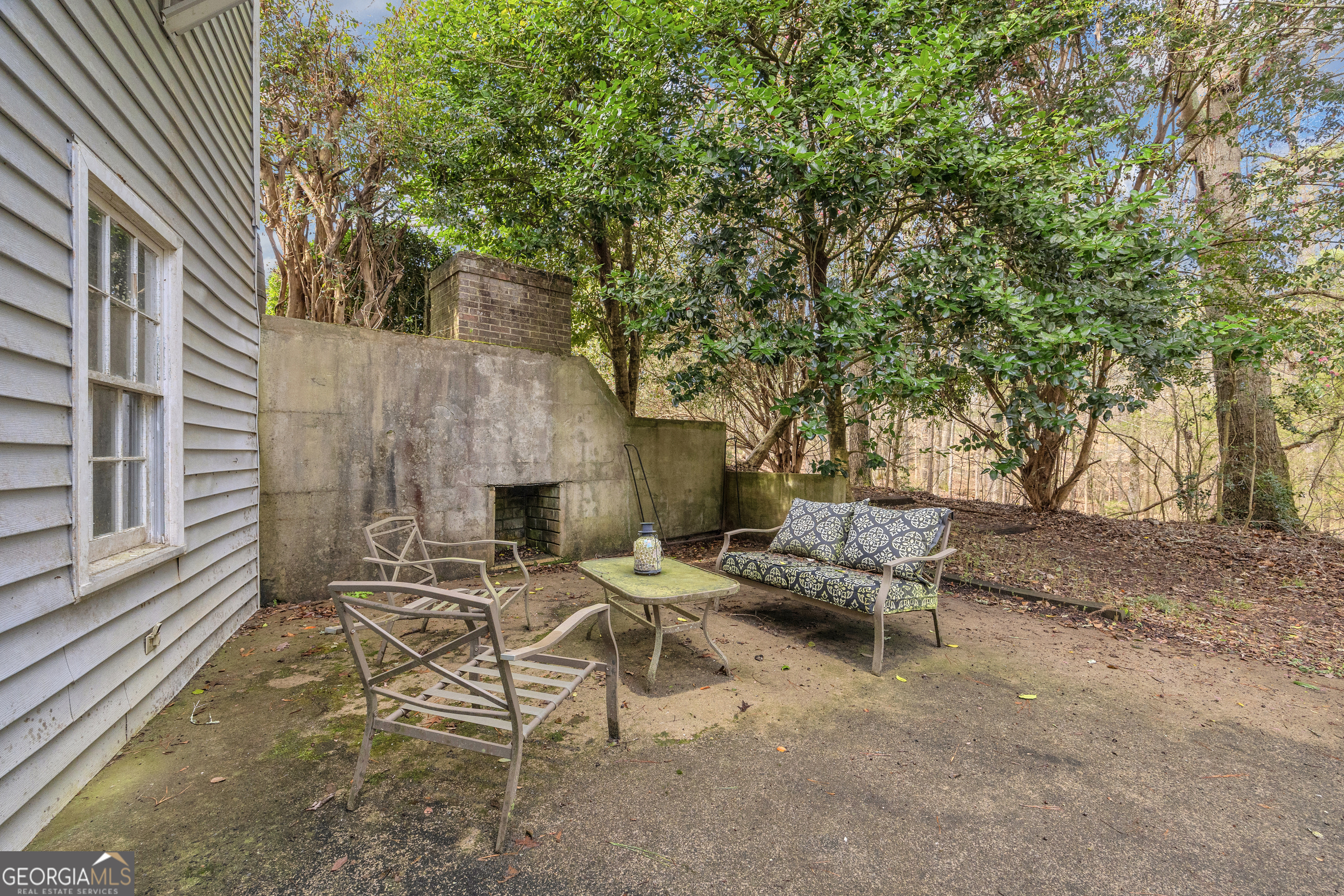 1640 Wire Bridge Road Watkinsville, GA 30677 - Photo 42 of 74 a view of backyard with outdoor seating and trees
