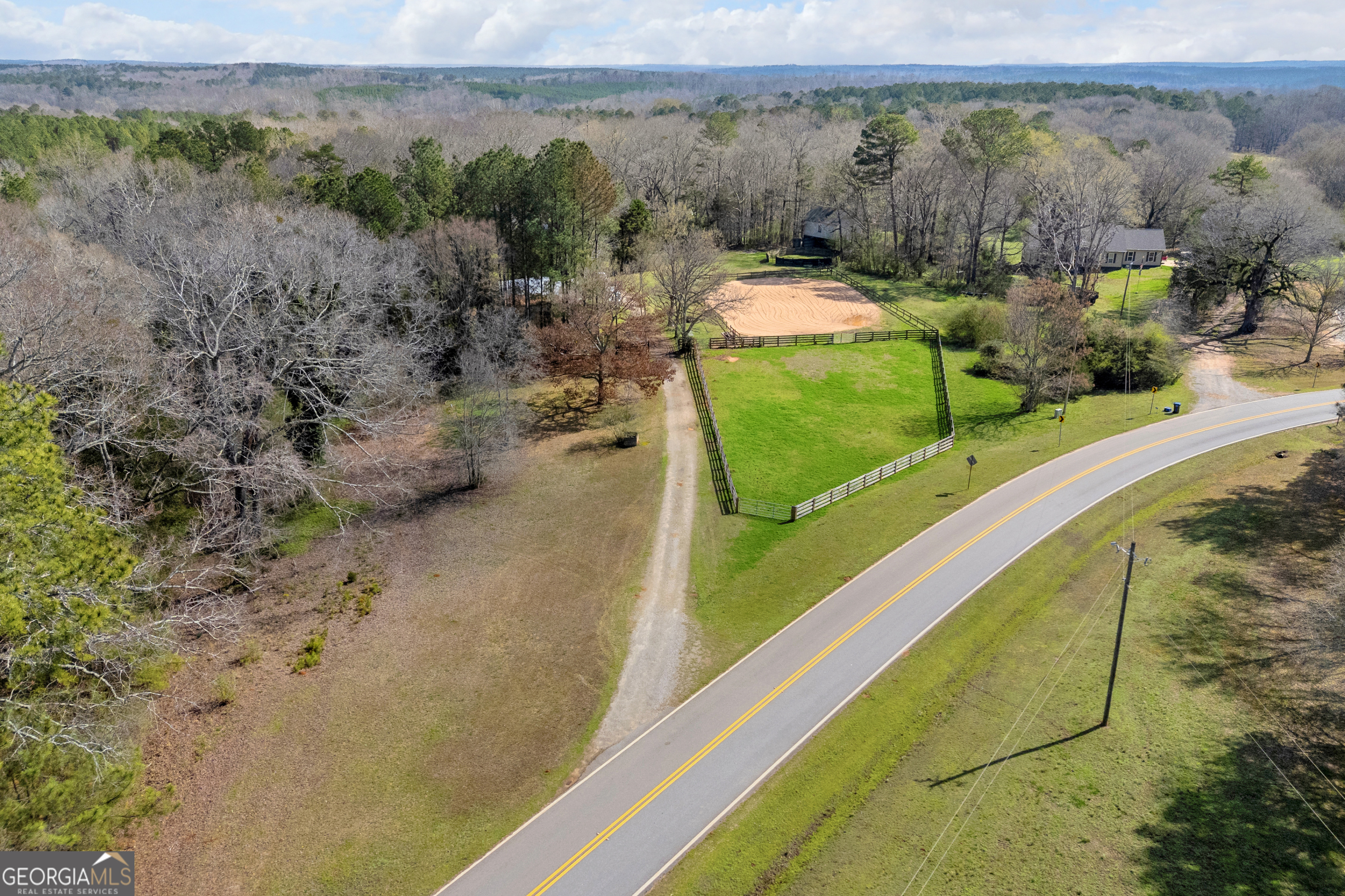 1640 Wire Bridge Road Watkinsville, GA 30677 - Photo 47 of 74 a view of a swimming pool with a yard and mountain view