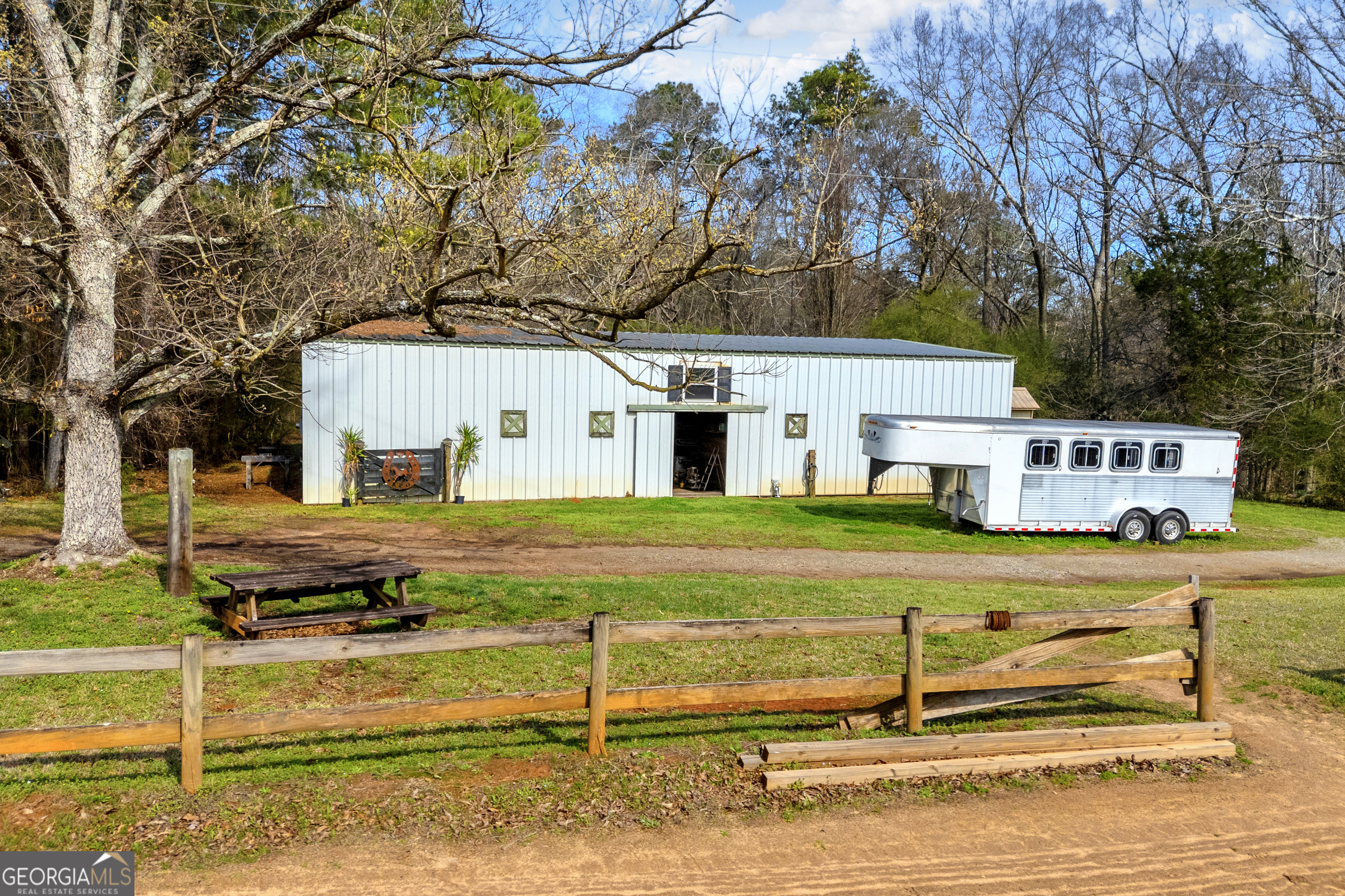 1640 Wire Bridge Road Watkinsville, GA 30677 - Photo 52 of 74 a view of a house with a yard