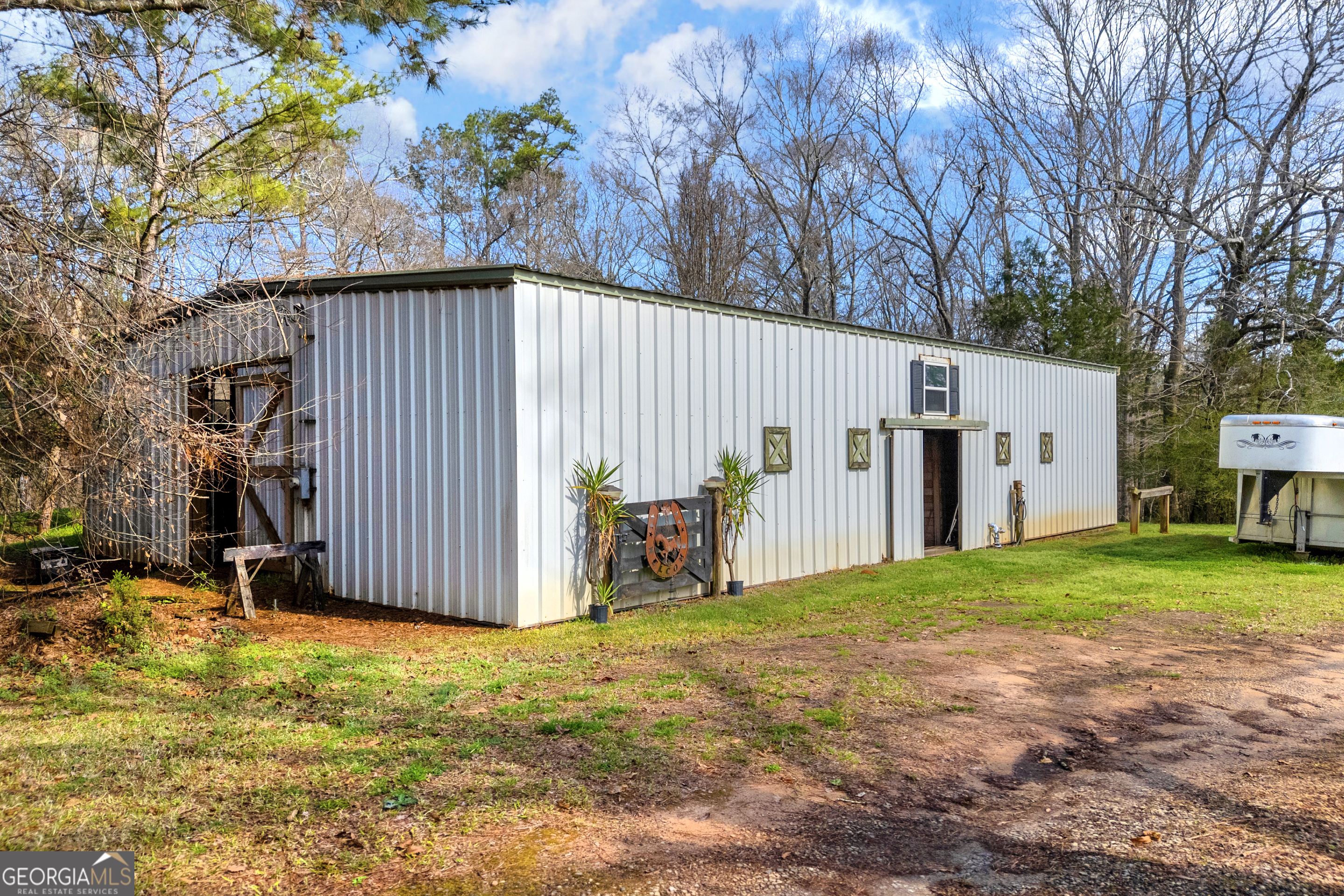 1640 Wire Bridge Road Watkinsville, GA 30677 - Photo 53 of 74 a view of backyard with tub and trees