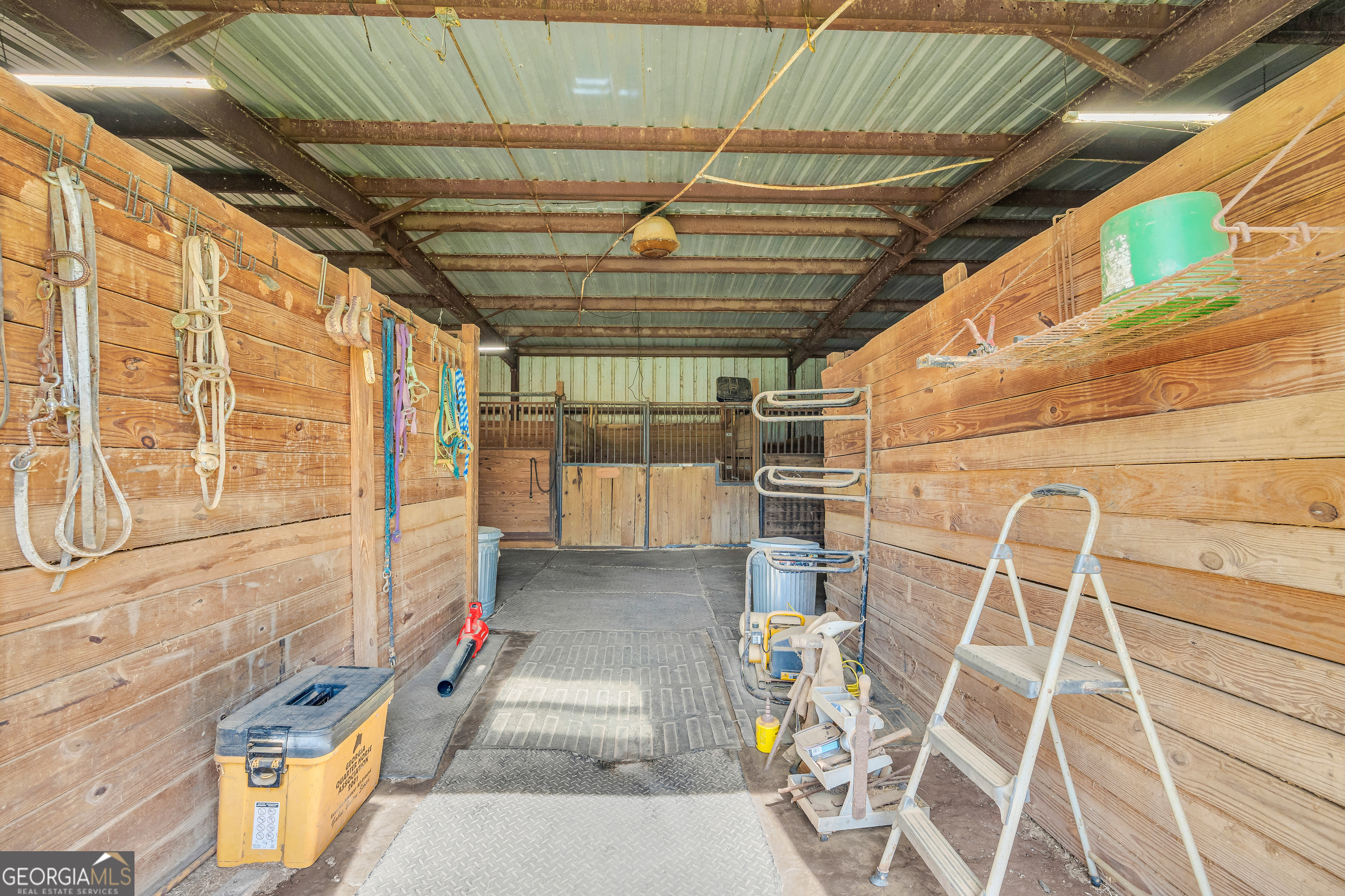 1640 Wire Bridge Road Watkinsville, GA 30677 - Photo 55 of 74 a view of a room with racks on the wall