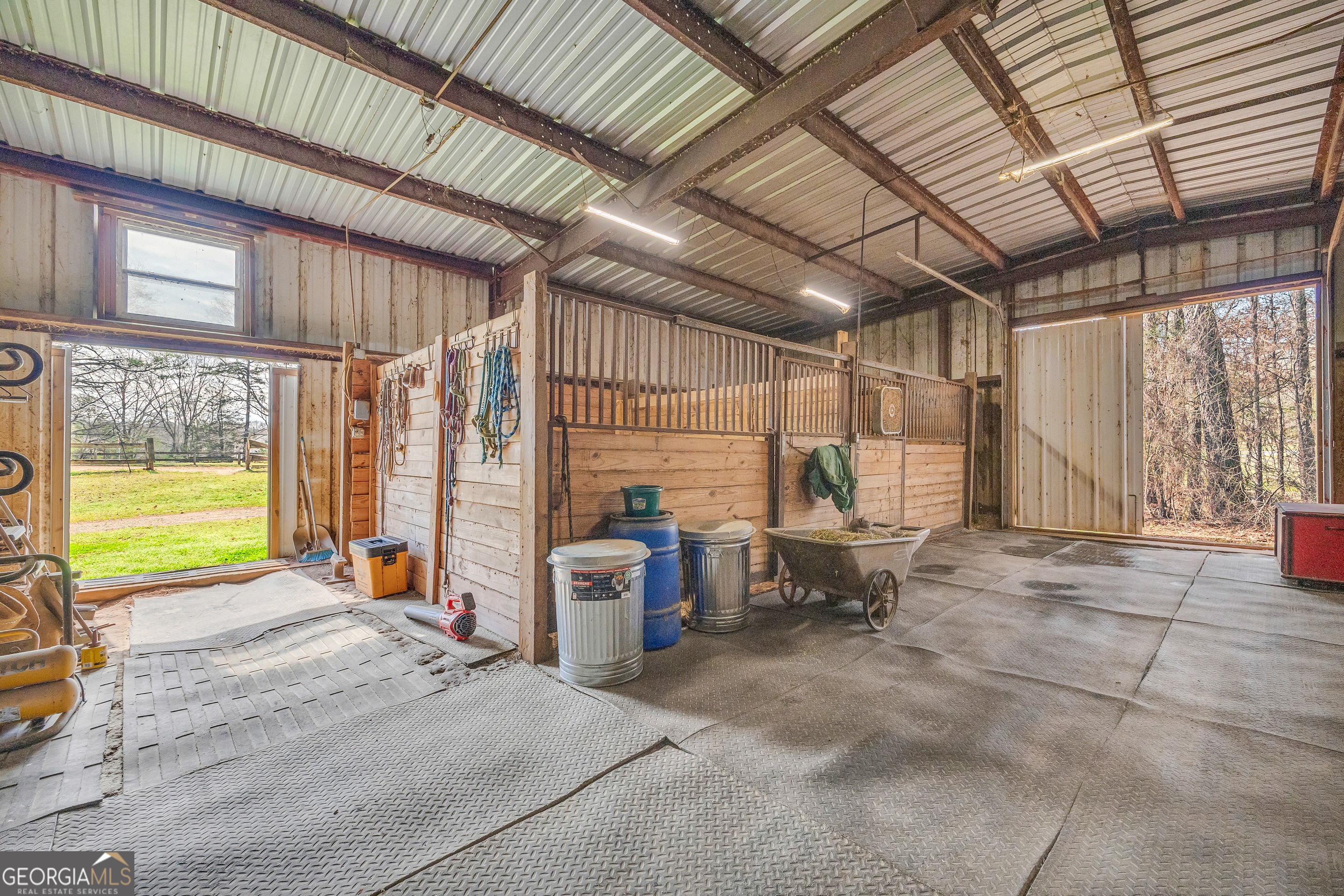 1640 Wire Bridge Road Watkinsville, GA 30677 - Photo 58 of 74 a backyard of a house with barbeque oven table and chairs