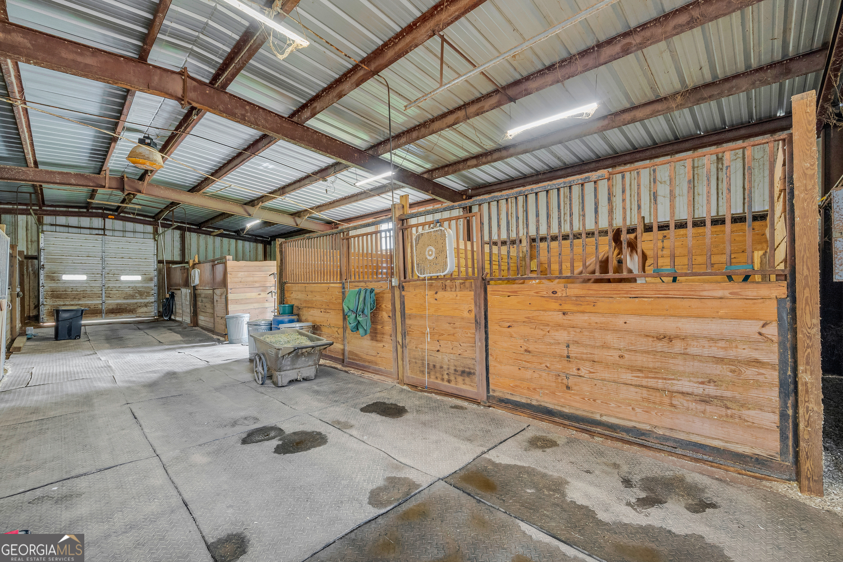 1640 Wire Bridge Road Watkinsville, GA 30677 - Photo 61 of 74 a view of a porch with a wooden roof