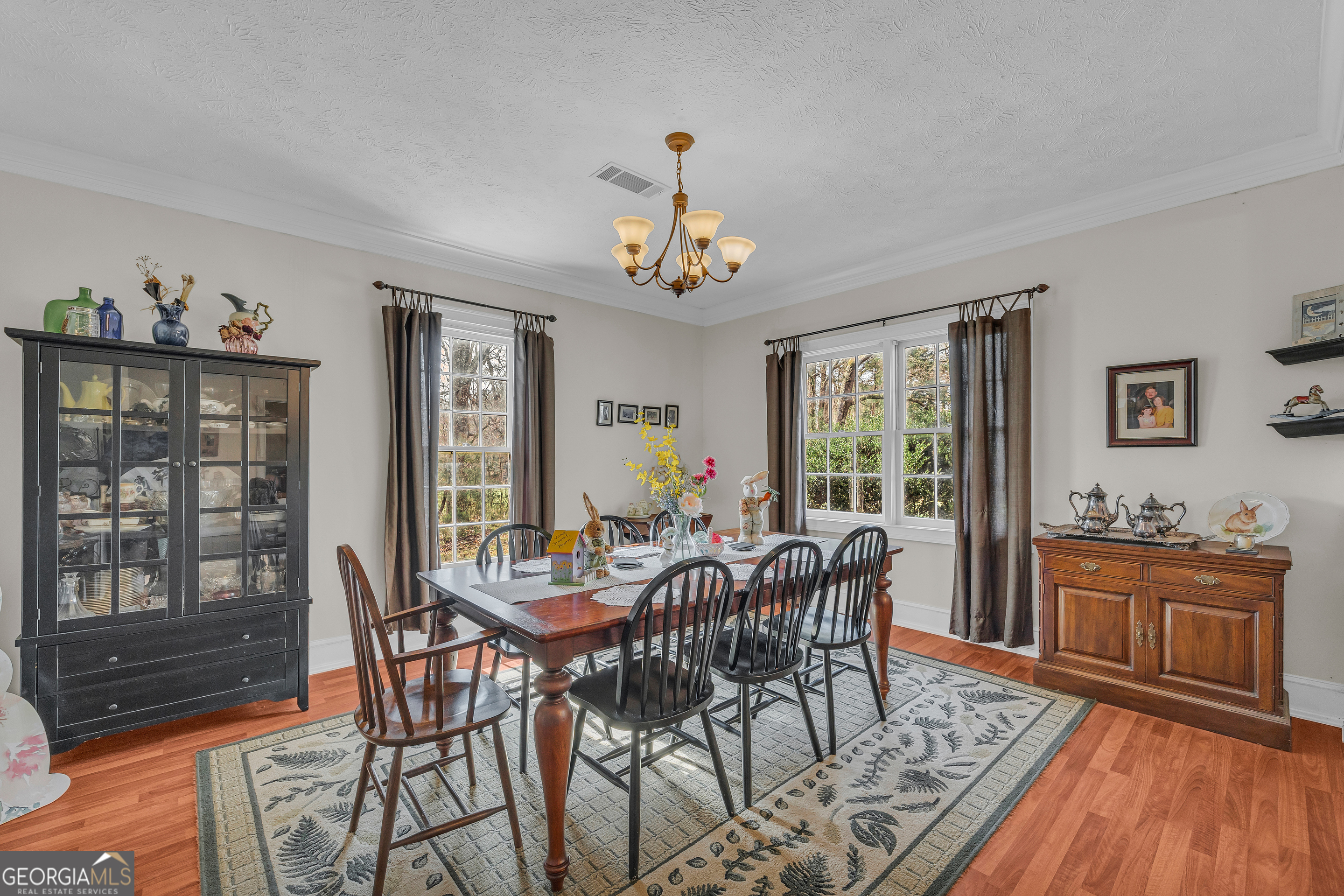 1640 Wire Bridge Road Watkinsville, GA 30677 - Photo 10 of 74 a view of a dining room with furniture window and wooden floor