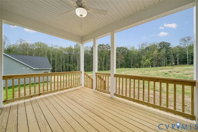 a view of a balcony with wooden floor