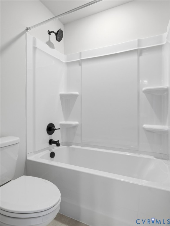 1711 Reed Marsh Lane Goochland, VA 23063 - Photo 22 of 25 a white toilet sitting next to a bath tub