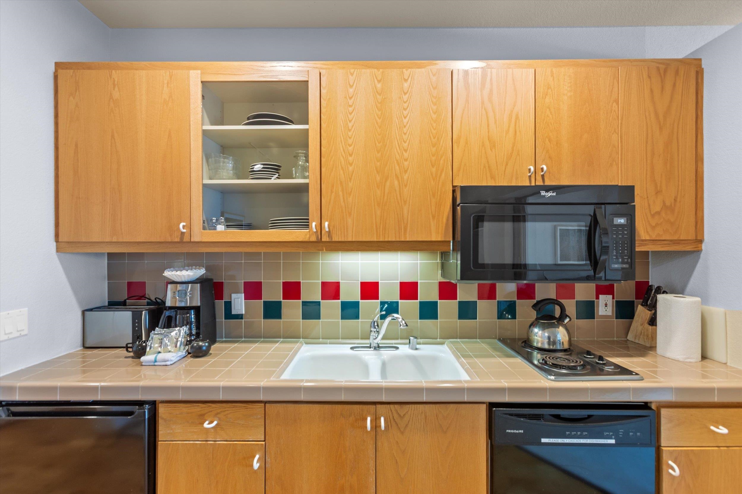 201 Shirley Cyn Road, Unit 247 Olympic Valley, CA 96146 - Photo 5 of 27 a kitchen sink with granite countertop lots of counter top space