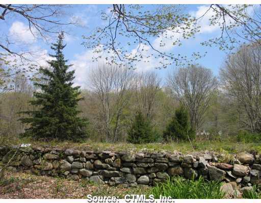 638 Opening Hill Road Madison, CT 06443 - Photo 1 of 1 a view of a yard with lots of bushes