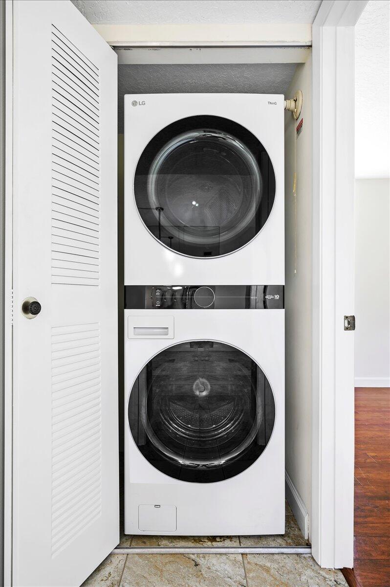 101 Pinecrest Circle, Unit A Jupiter, FL 33458 - Photo 18 of 25 a close up view of washer and dryer