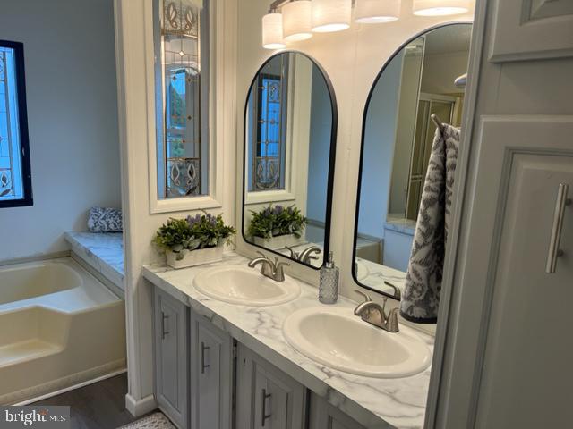 5186 Stone Terrace Drive Whitehall, PA 18052 - Photo 6 of 7 a bathroom with 2 sink and a mirror