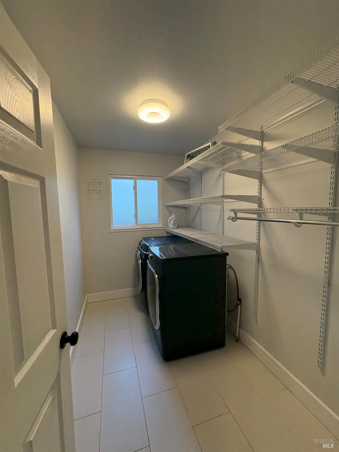 5705 Davis Circle Rohnert Park, CA 94928 - Photo 11 of 46 a kitchen with a cabinets and a stove top oven
