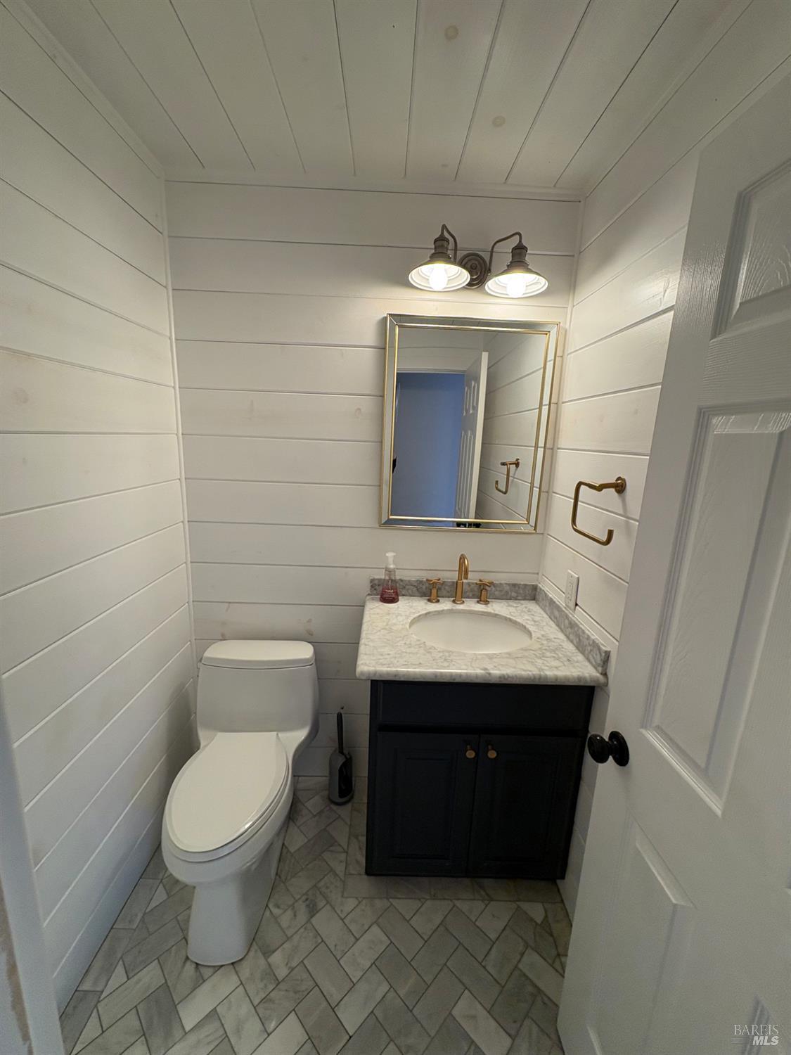 5705 Davis Circle Rohnert Park, CA 94928 - Photo 15 of 46 a bathroom with a sink and a mirror