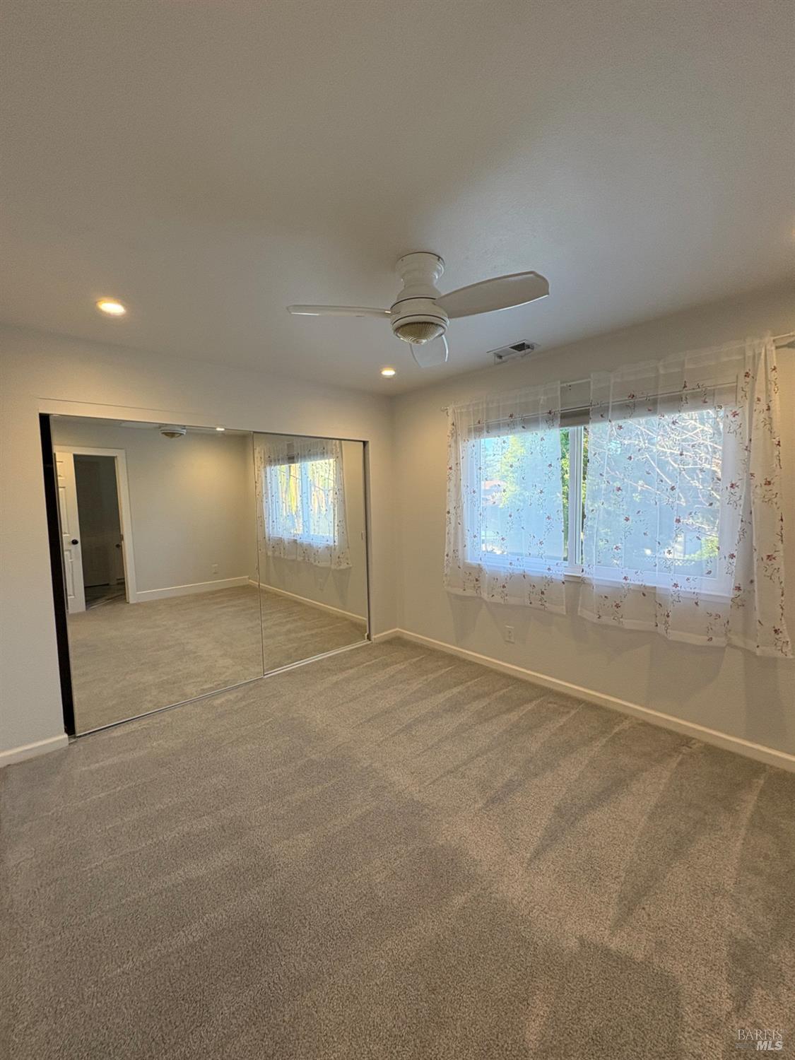 5705 Davis Circle Rohnert Park, CA 94928 - Photo 22 of 46 a view of an empty room with a window