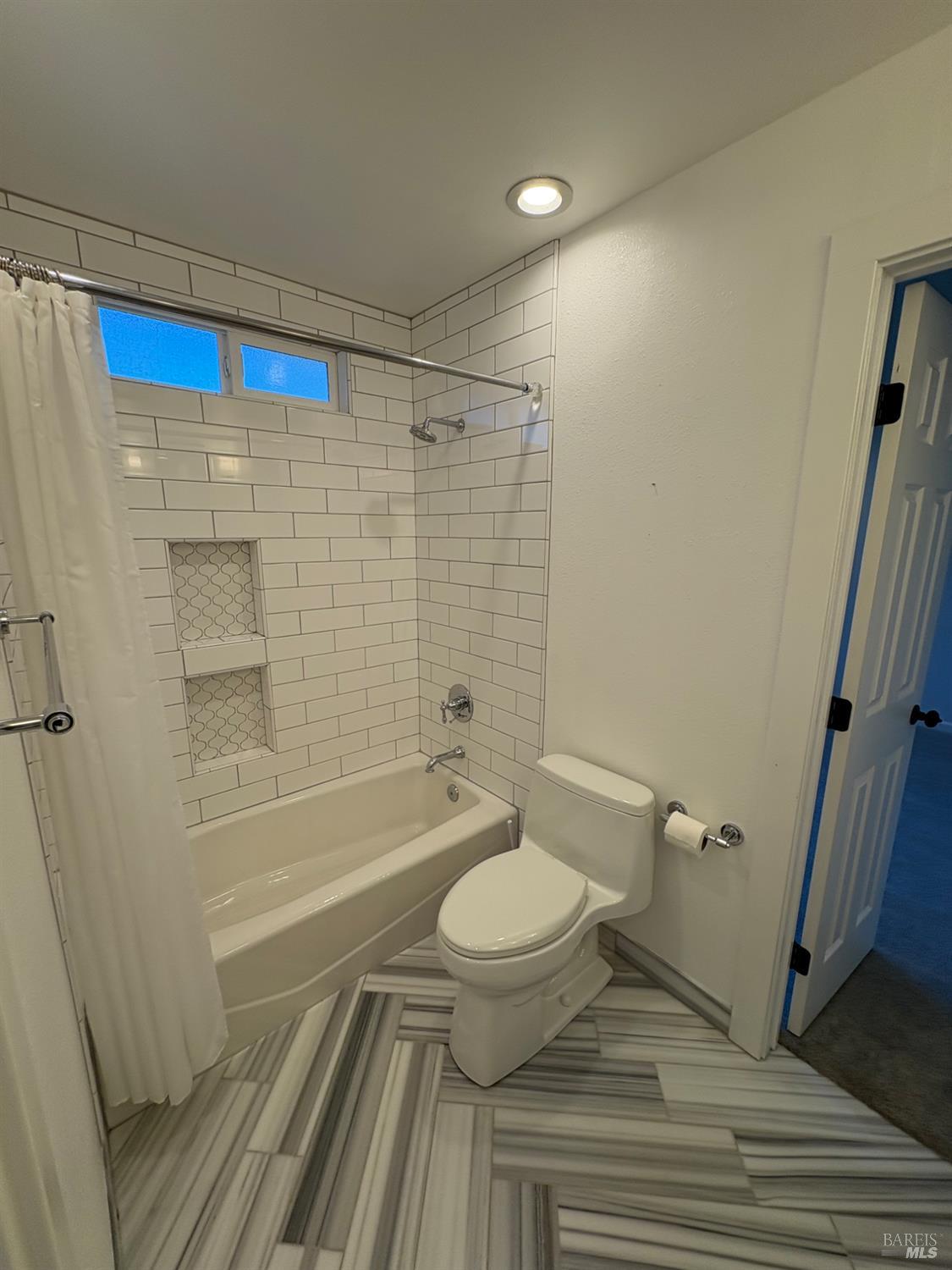5705 Davis Circle Rohnert Park, CA 94928 - Photo 26 of 46 a bathroom with a sink a toilet a mirror and shower