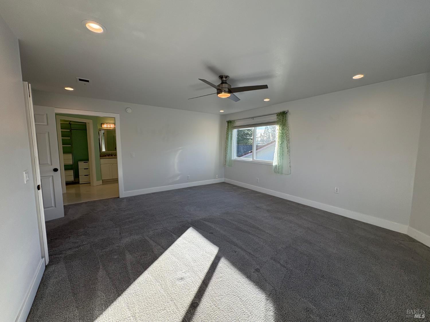 5705 Davis Circle Rohnert Park, CA 94928 - Photo 33 of 46 wooden floor in an empty room with a window