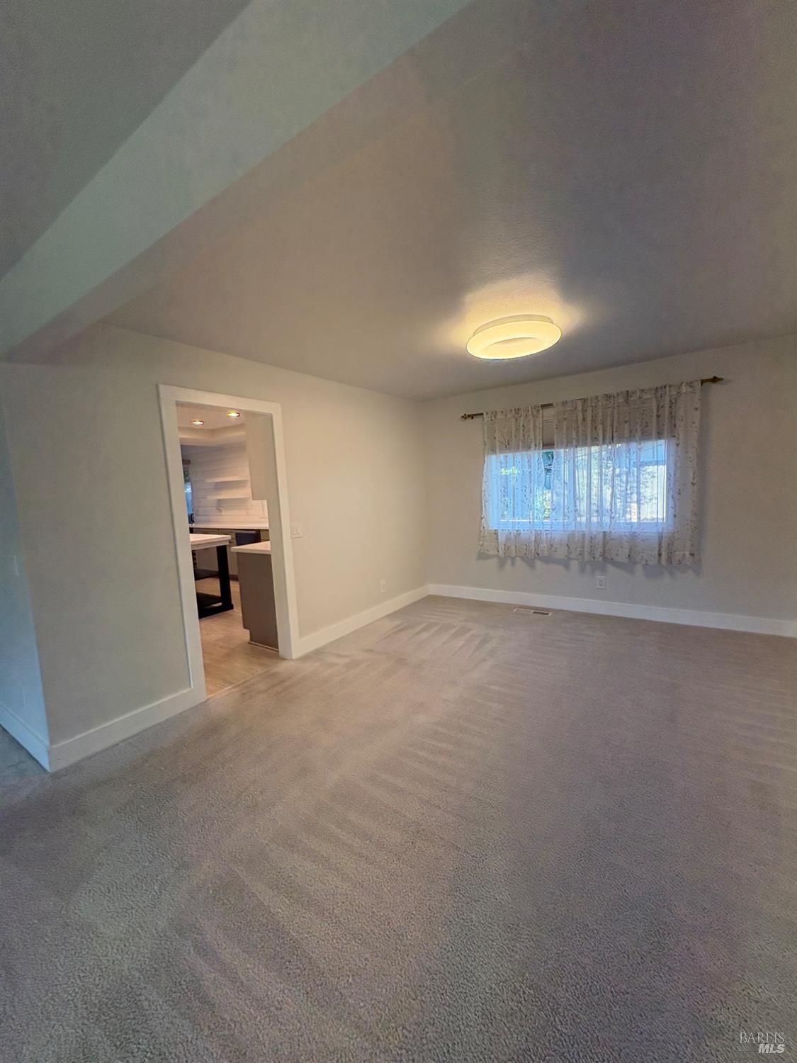 5705 Davis Circle Rohnert Park, CA 94928 - Photo 4 of 46 an empty room with a empty space and windows