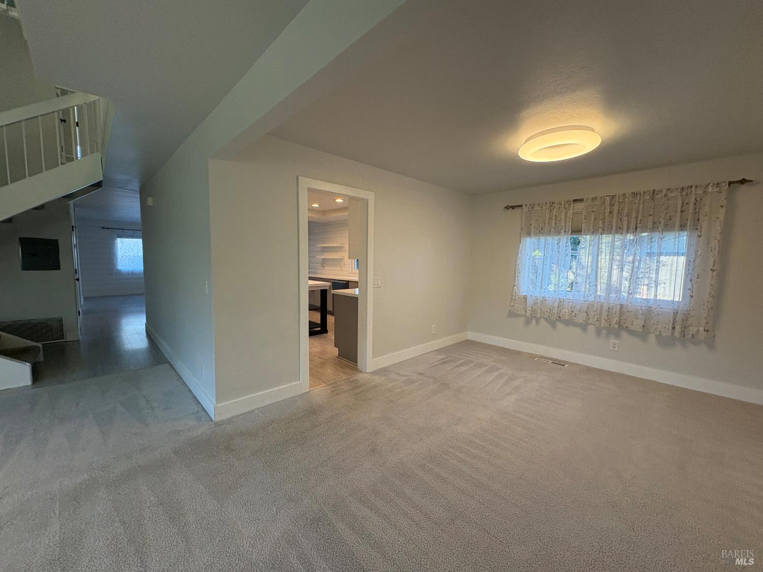 5705 Davis Circle Rohnert Park, CA 94928 - Photo 5 of 46 an empty room with windows and cabinet