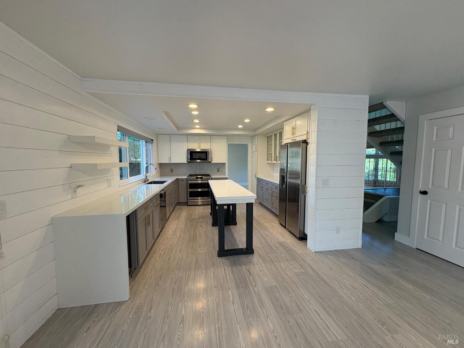 5705 Davis Circle Rohnert Park, CA 94928 - Photo 6 of 46 a kitchen with furniture and a wooden floor