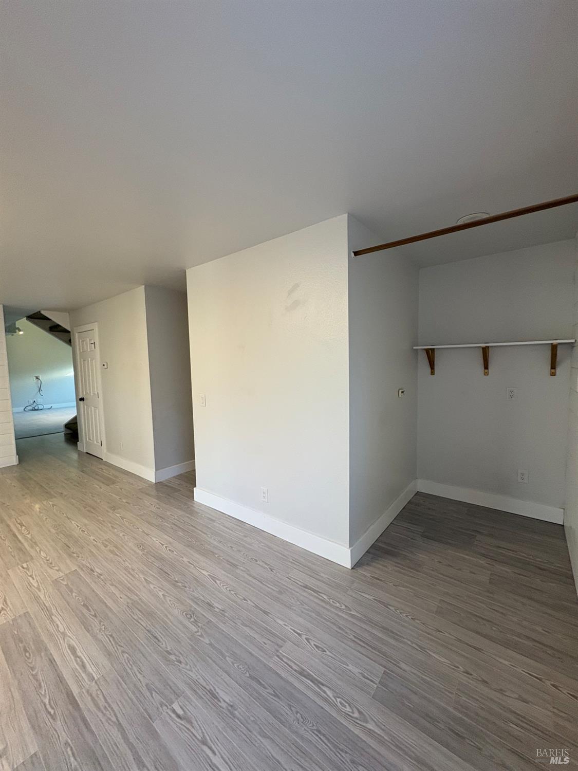5705 Davis Circle Rohnert Park, CA 94928 - Photo 9 of 46 a view of an empty room with wooden floor