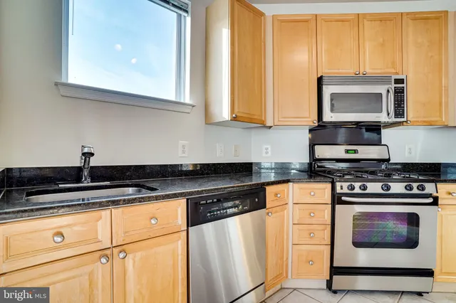 a view of a livingroom with furniture and wooden floor