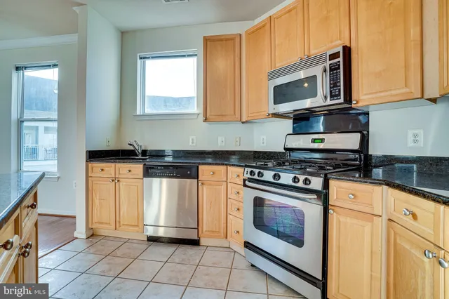 an empty room with a ceiling fan