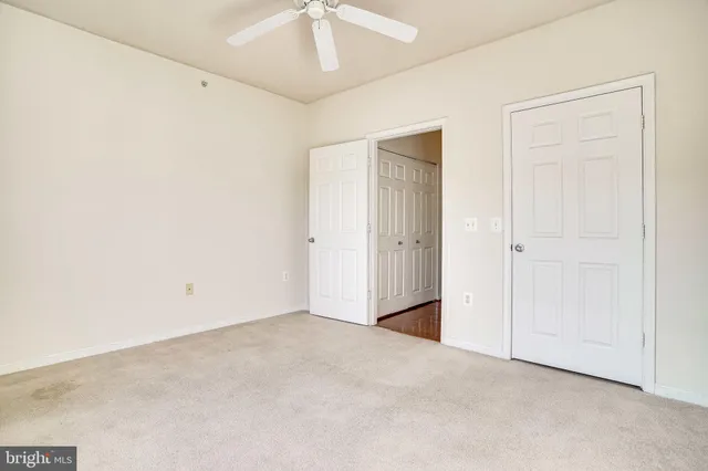 a view of a bathroom from the hallway