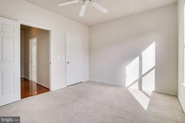 a bathroom with a toilet sink and shower