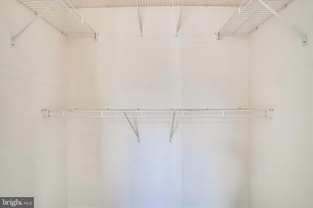 a front view of a building with a lot of windows