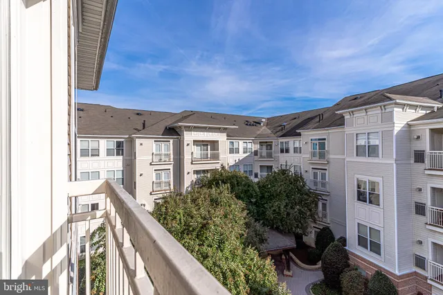 a living room with fireplace furniture and a flat screen tv