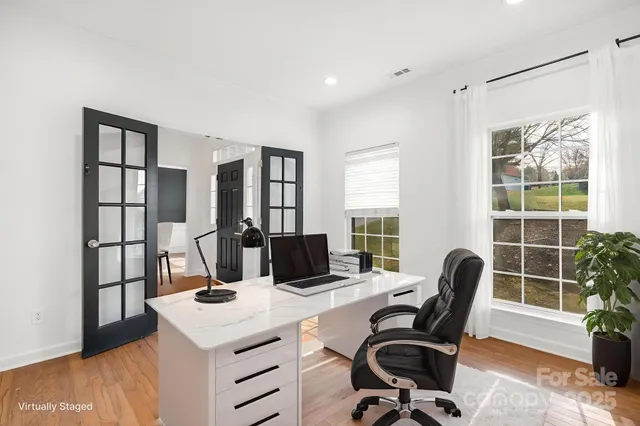 a kitchen with stainless steel appliances a sink stove and refrigerator