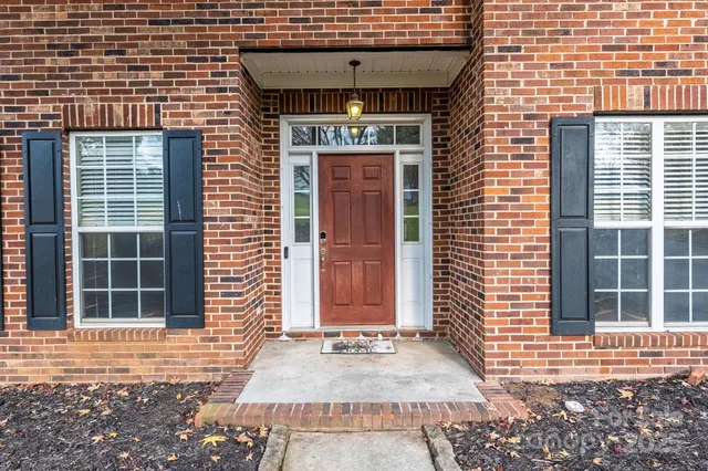 a front view of a house with a door