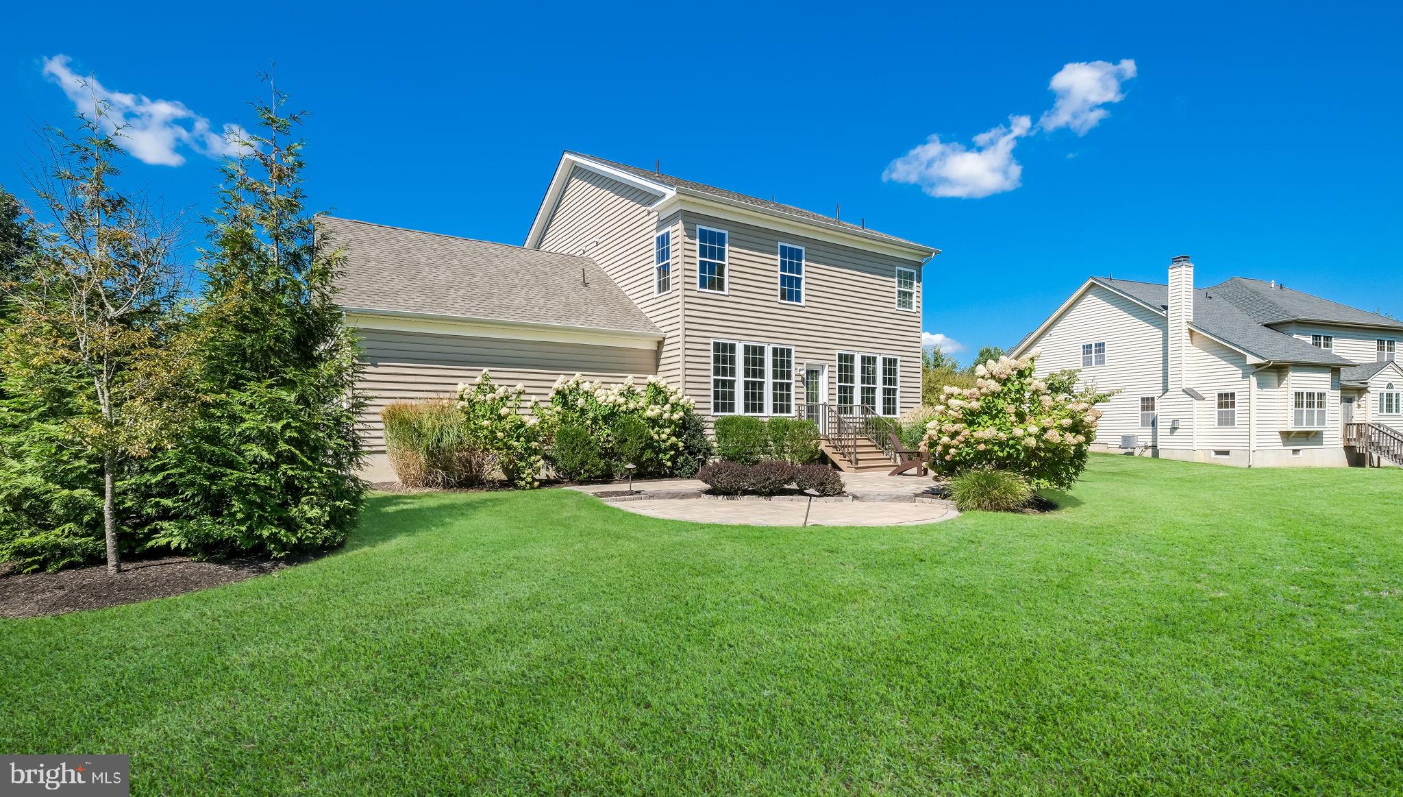 5068 Kratz Carriage Road Pipersville, PA 18947 - Photo 48 of 52 a view of a house with a yard and garden