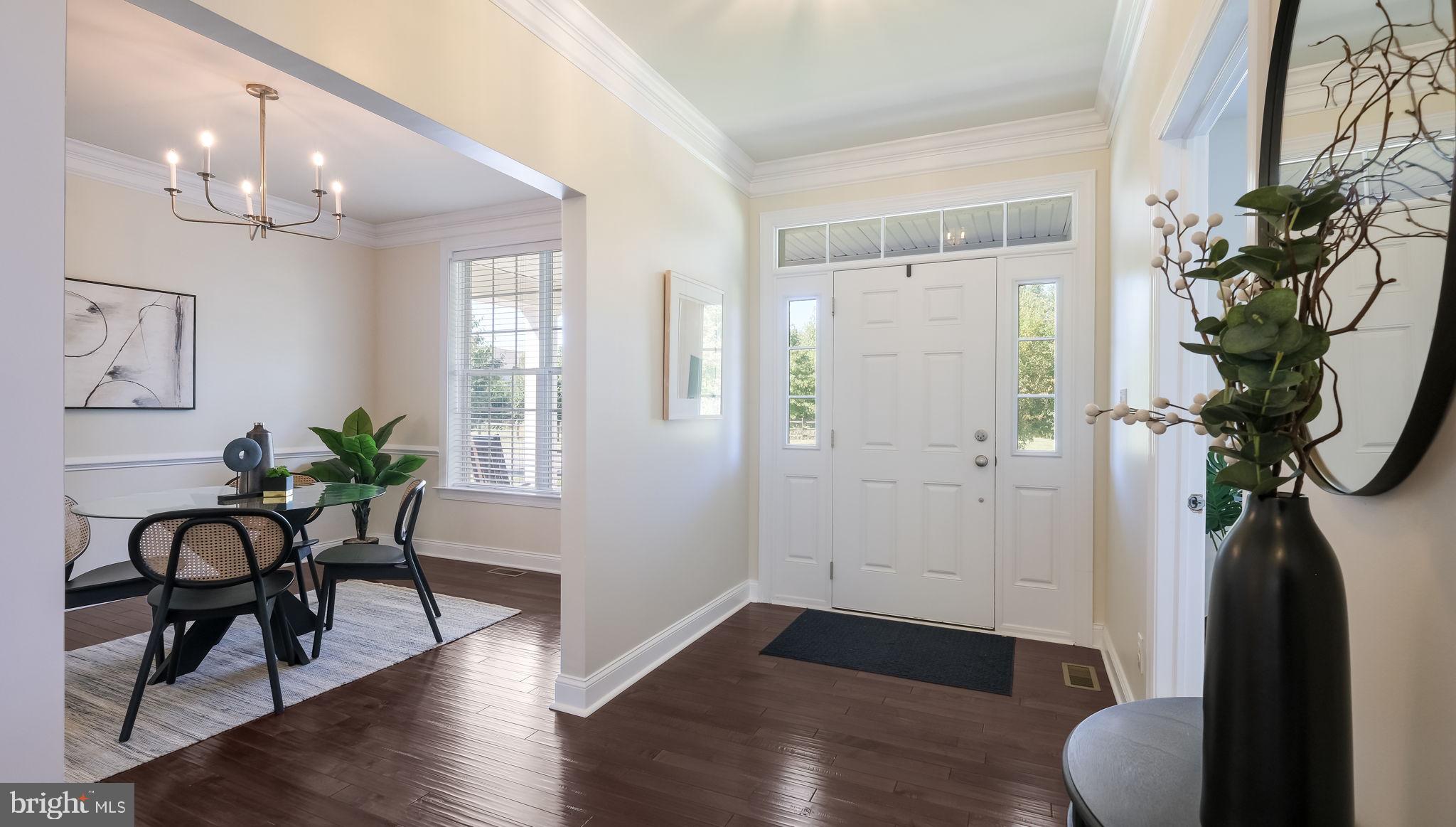 5068 Kratz Carriage Road Pipersville, PA 18947 - Photo 8 of 52 a view of a hallway with furniture and wooden floor