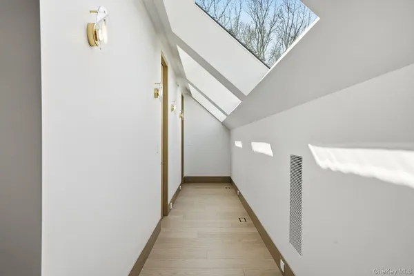 a view of a hallway with entryway