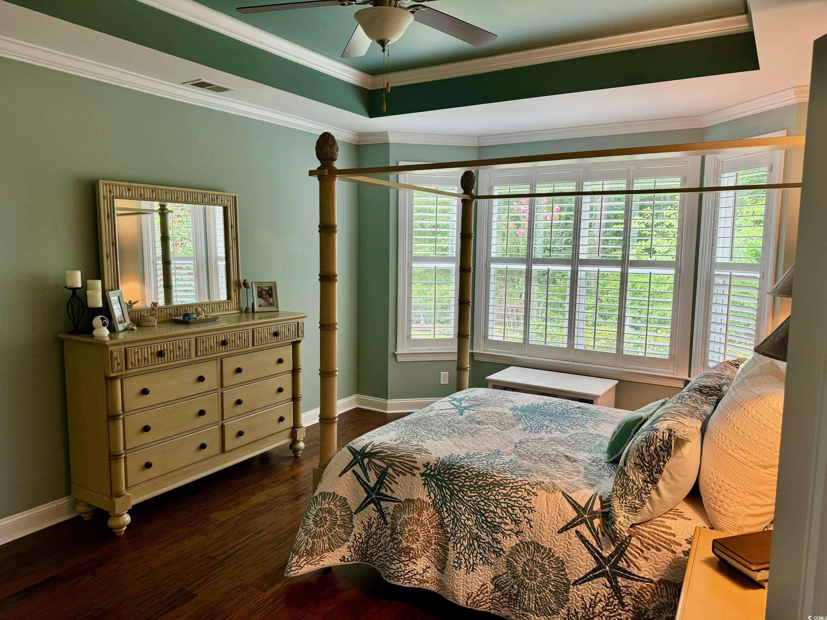 1592 Buckingham Avenue Myrtle Beach, SC 29577 - Photo 12 of 37 Bedroom featuring ceiling fan, a raised ceiling, o