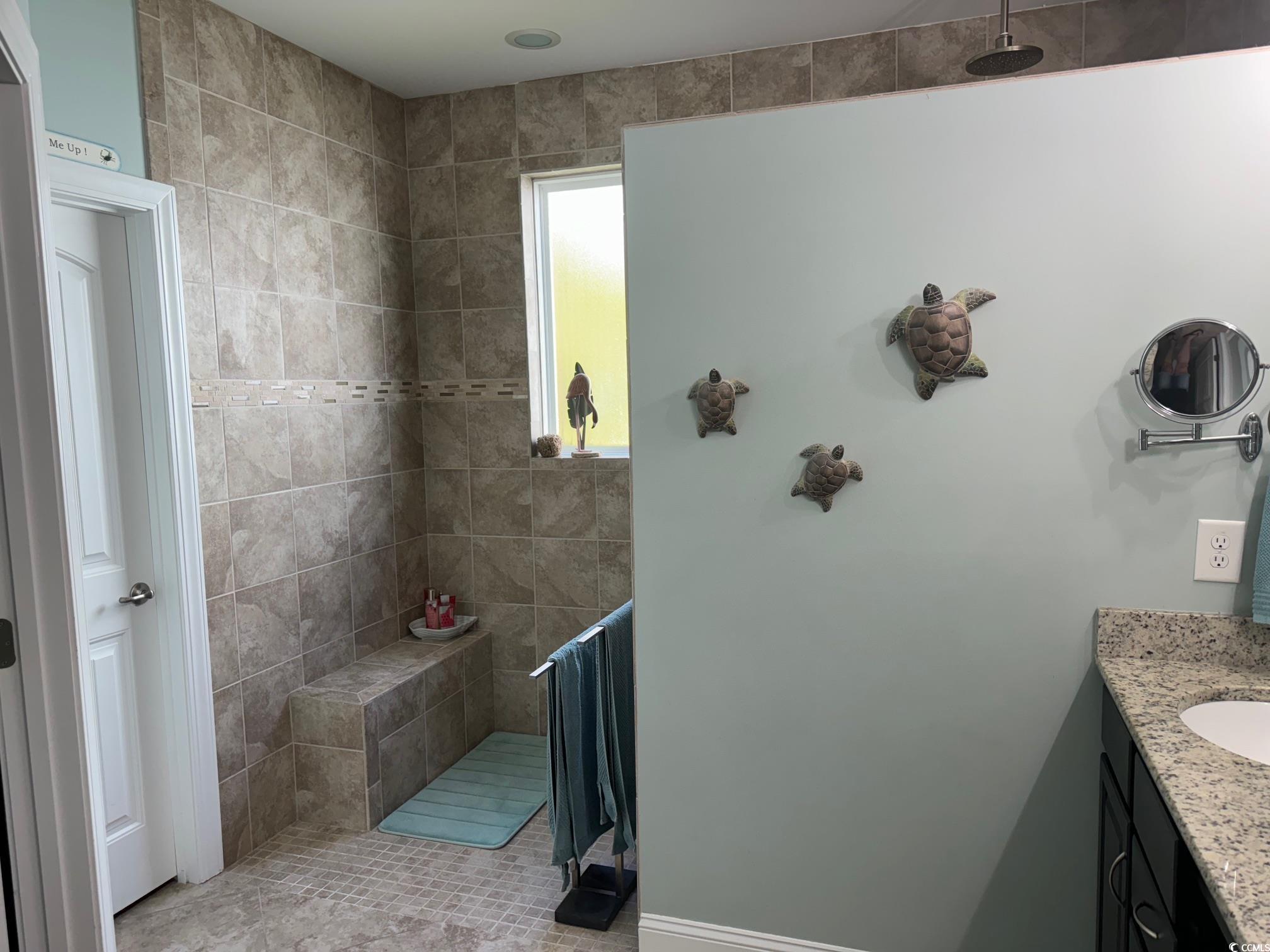 1592 Buckingham Avenue Myrtle Beach, SC 29577 - Photo 16 of 37 Bathroom with tile patterned floors and vanity