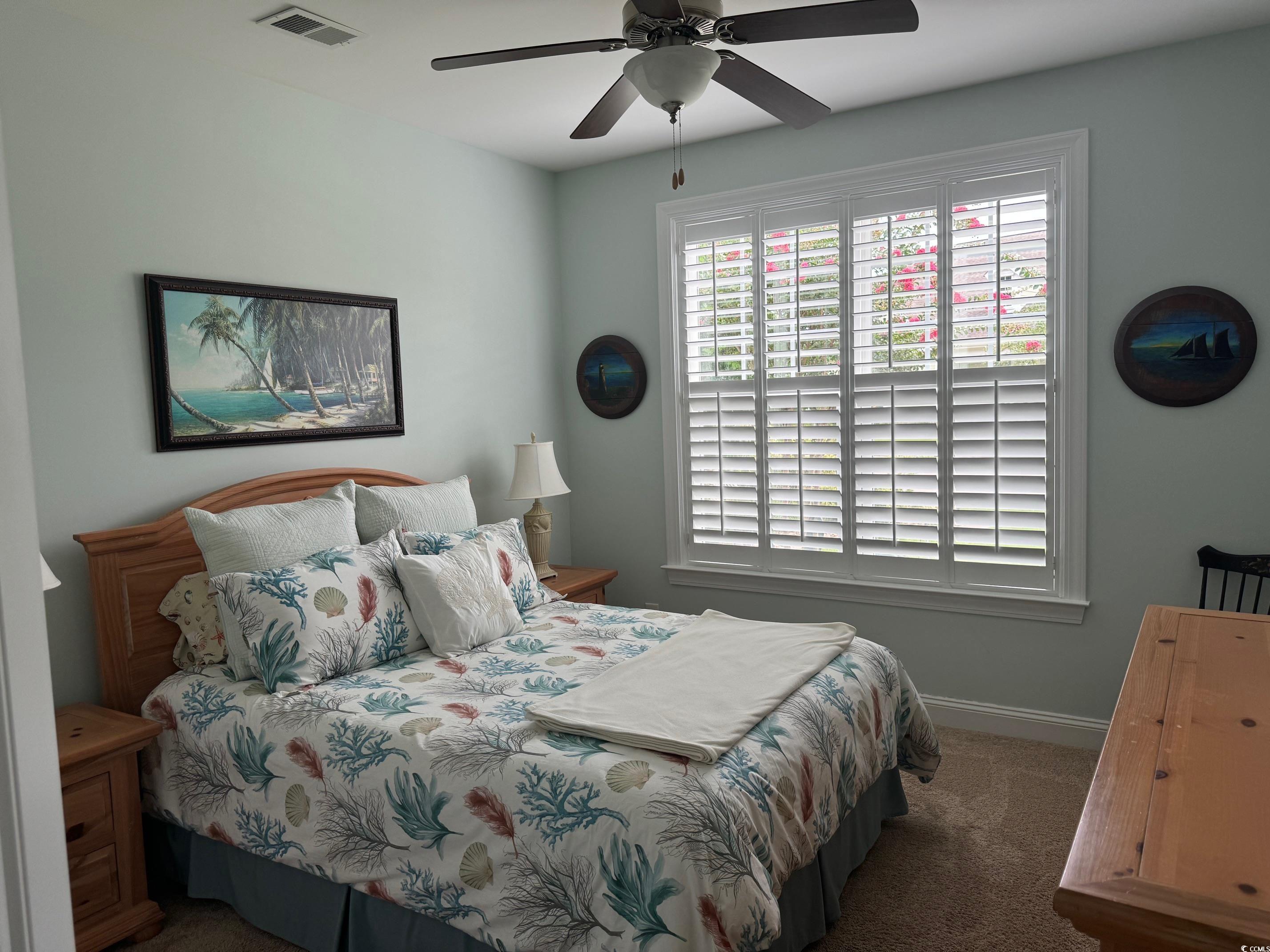 1592 Buckingham Avenue Myrtle Beach, SC 29577 - Photo 17 of 37 Bedroom featuring carpet and ceiling fan