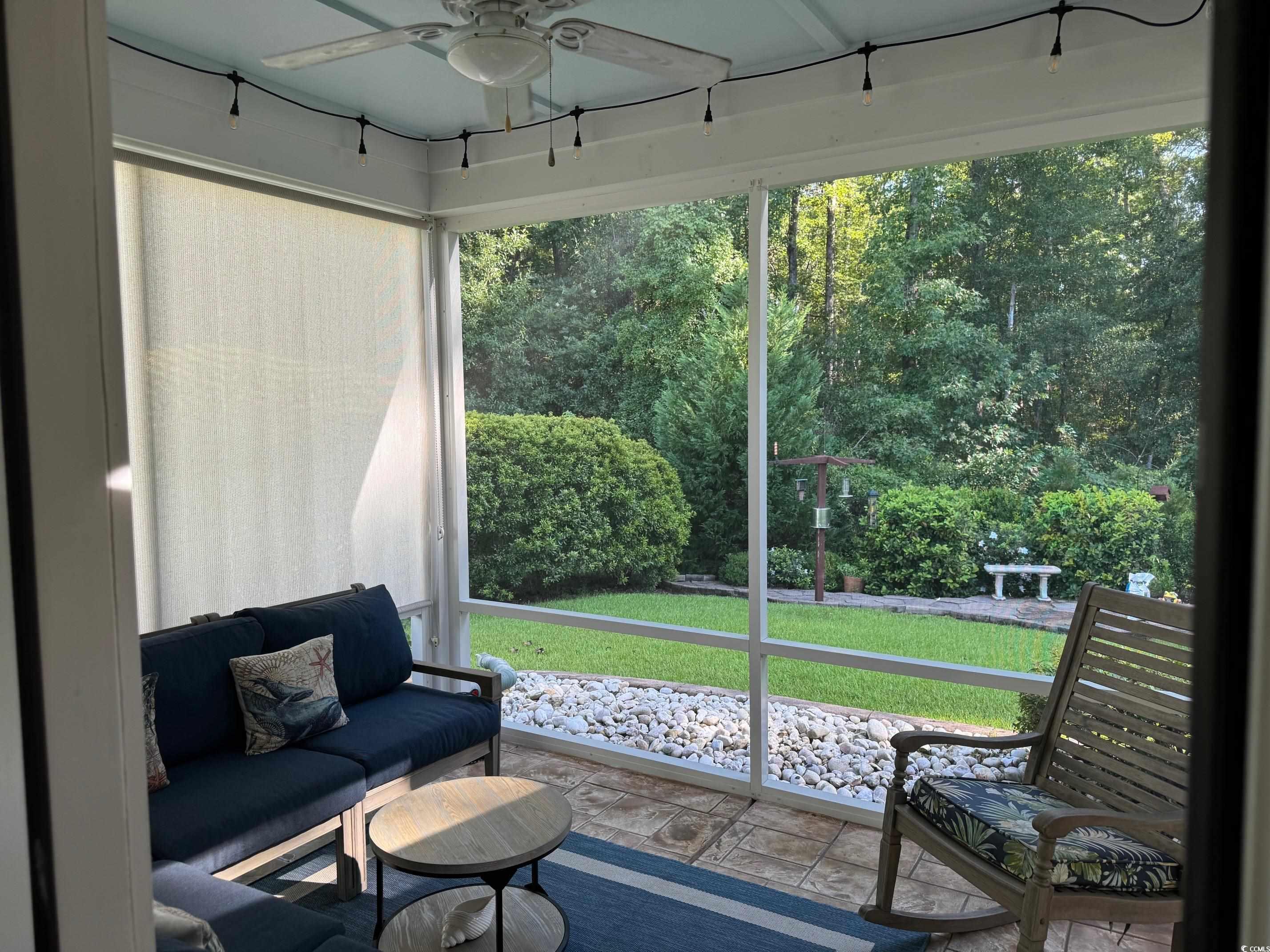 1592 Buckingham Avenue Myrtle Beach, SC 29577 - Photo 24 of 37 Screened in porch featuring ceiling fan