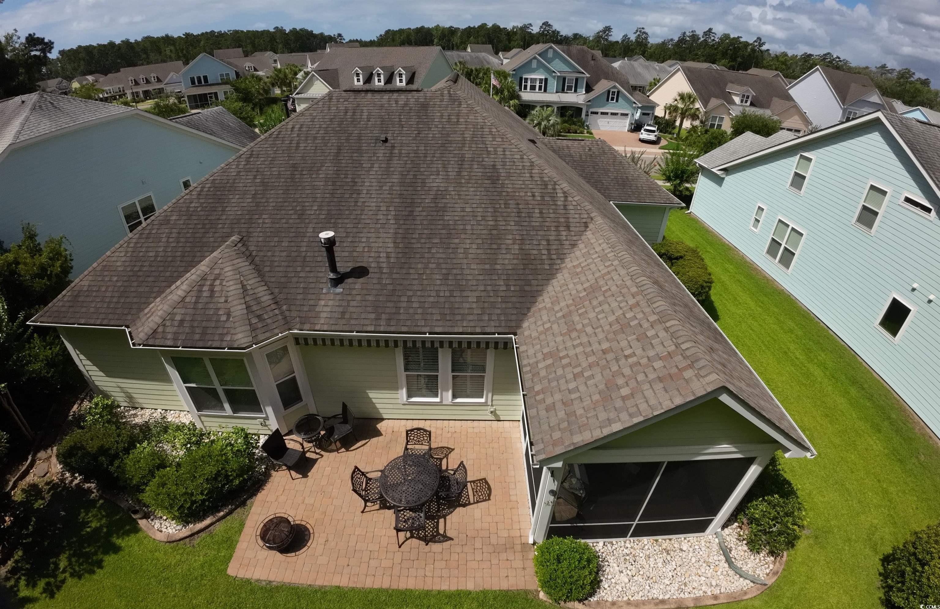1592 Buckingham Avenue Myrtle Beach, SC 29577 - Photo 34 of 37 Exterior space featuring a patio area and a lawn