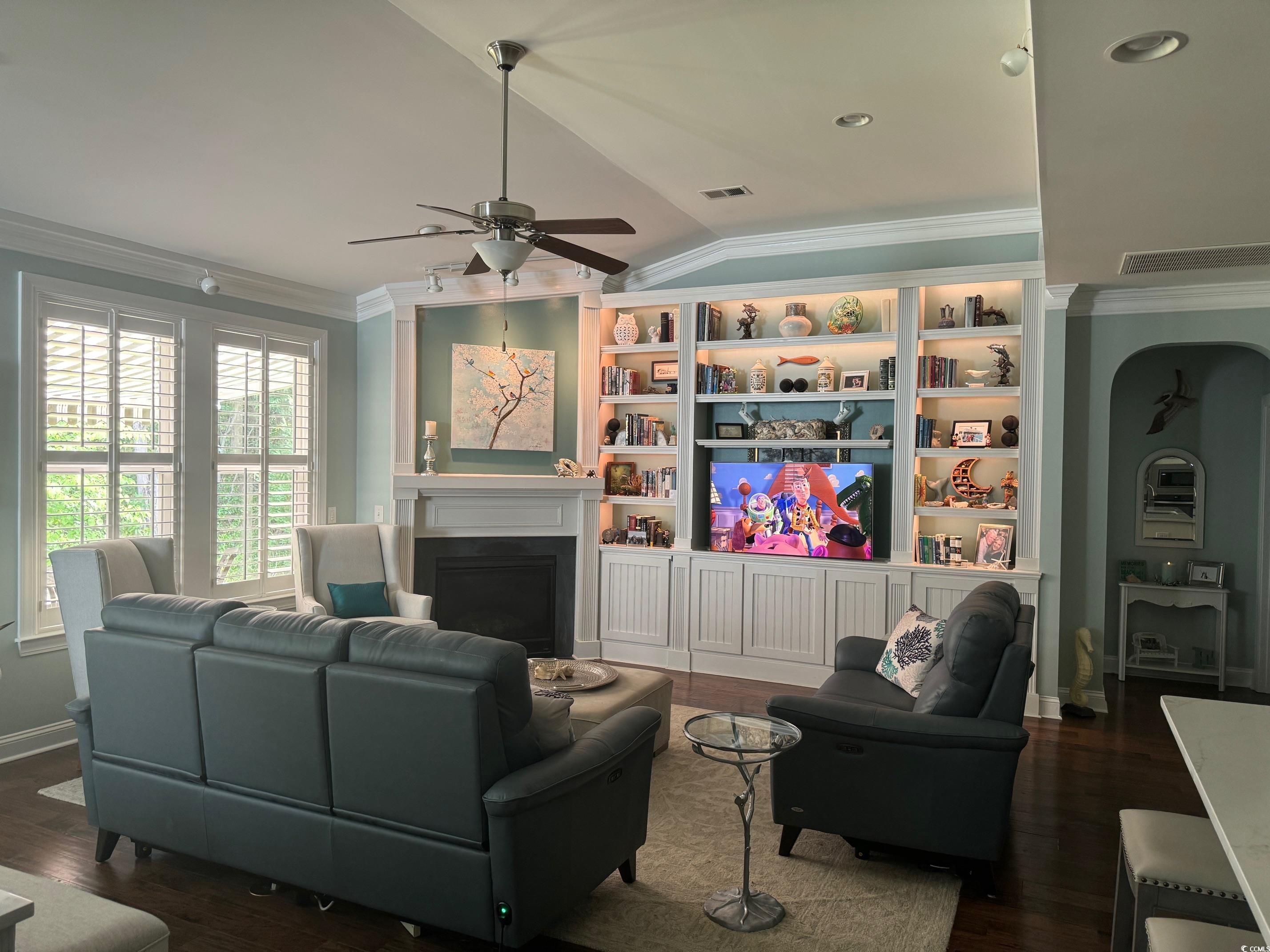 1592 Buckingham Avenue Myrtle Beach, SC 29577 - Photo 6 of 37 Living room with ceiling fan, built in shelves, da