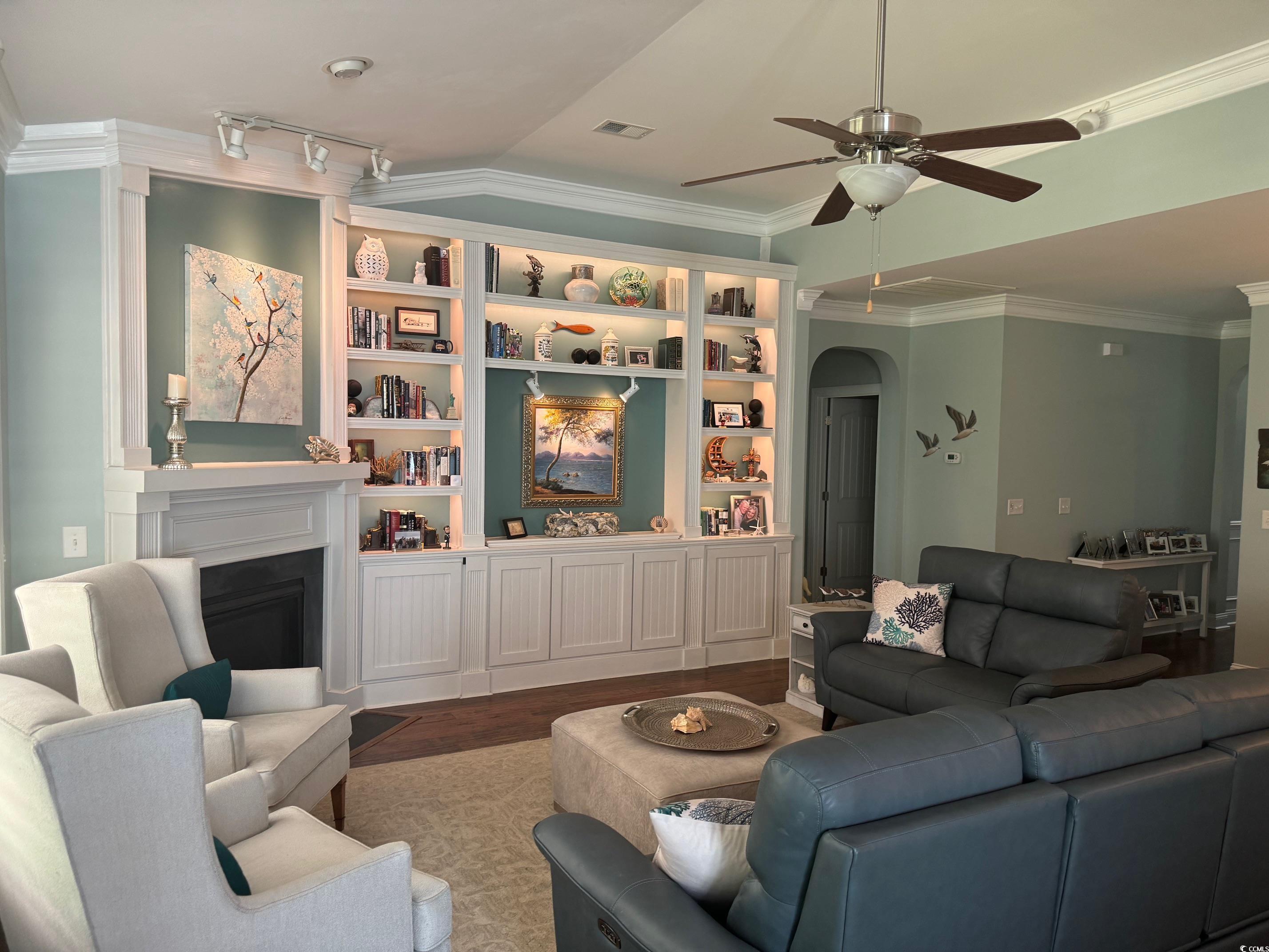 1592 Buckingham Avenue Myrtle Beach, SC 29577 - Photo 9 of 37 Living room with ornamental molding, hardwood / wo